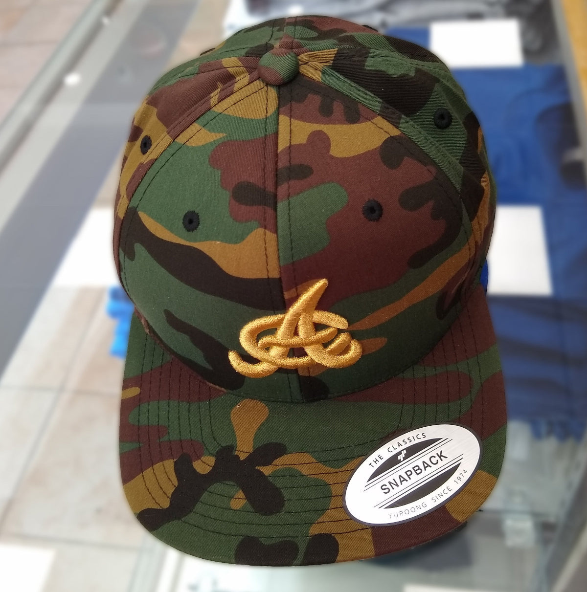 Aguilas Cibaeñas Embroidered SnapBack Camouflage Hat